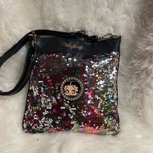 Betty Boop synthetic black crossbody bag with multi color sequins accents .